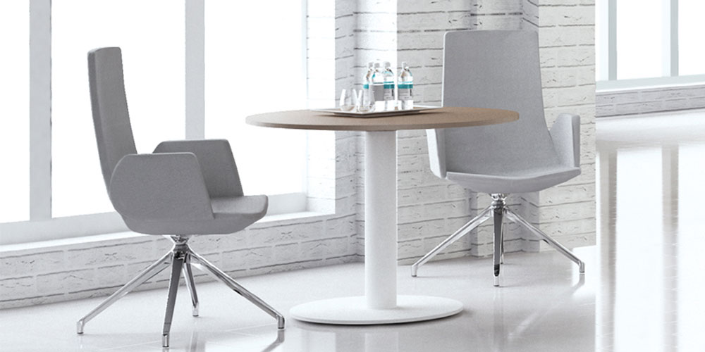 Forum cafe table with North Cape armchairs