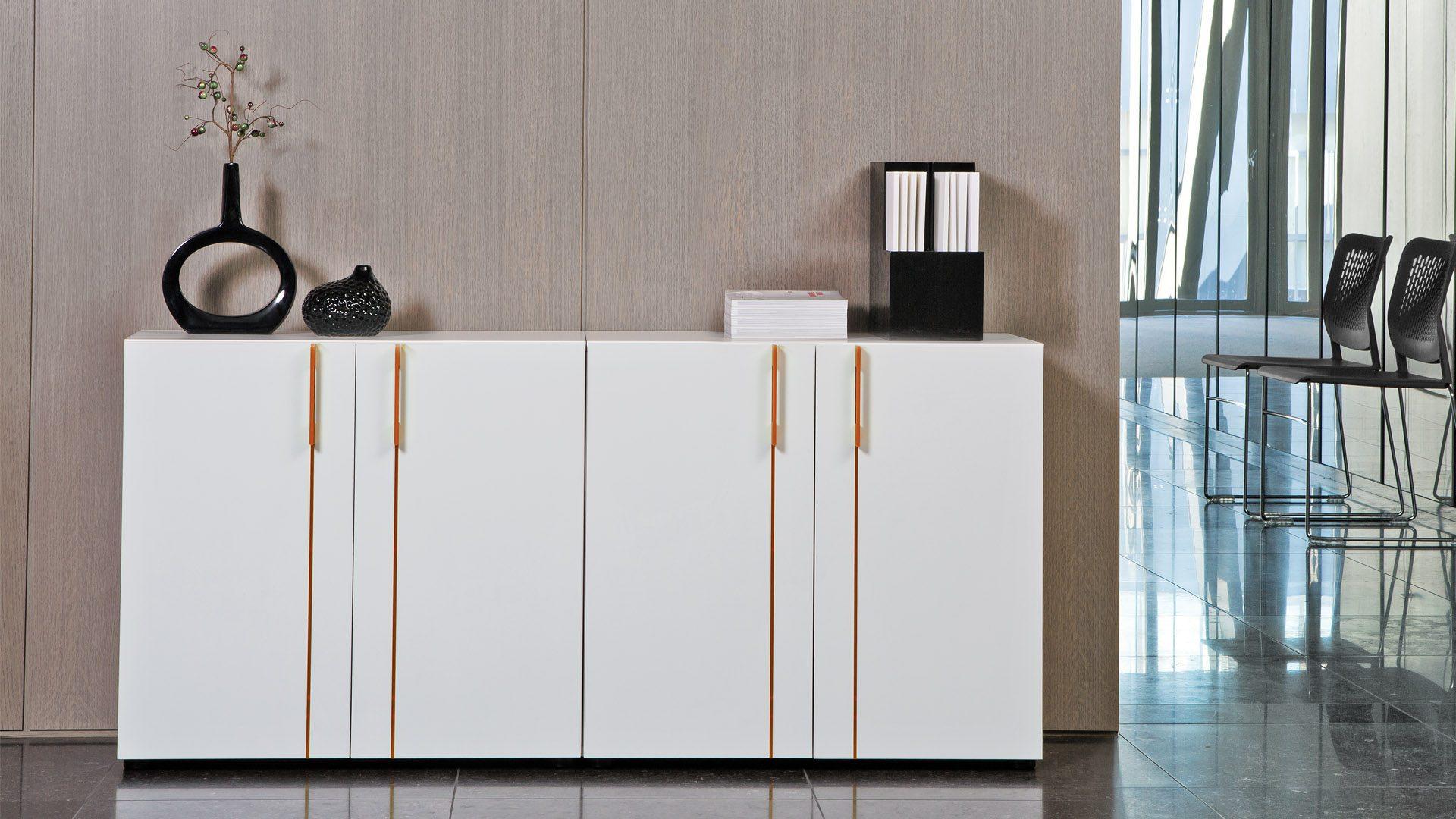 Nova storage cabinets with orange acrylic inserts and handles