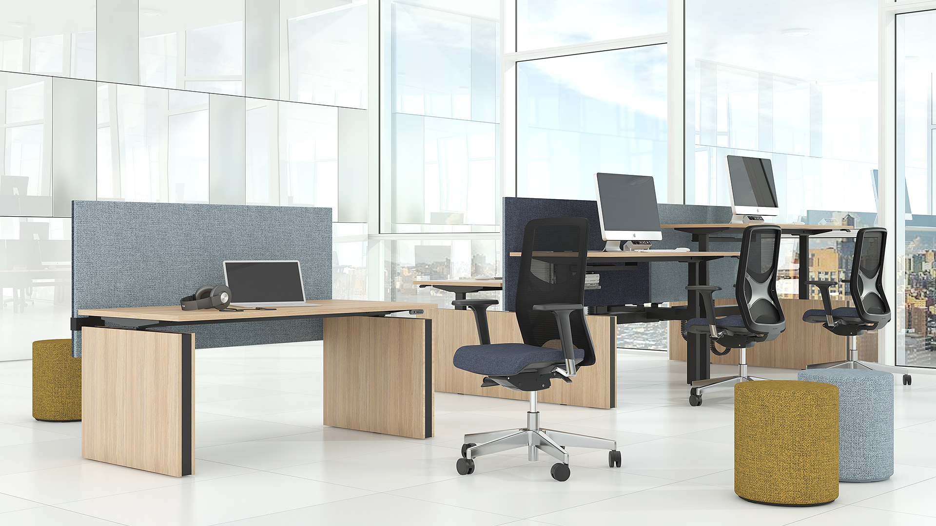 Motion sit/stand bench desks with Giro poufs and Wind task chairs
