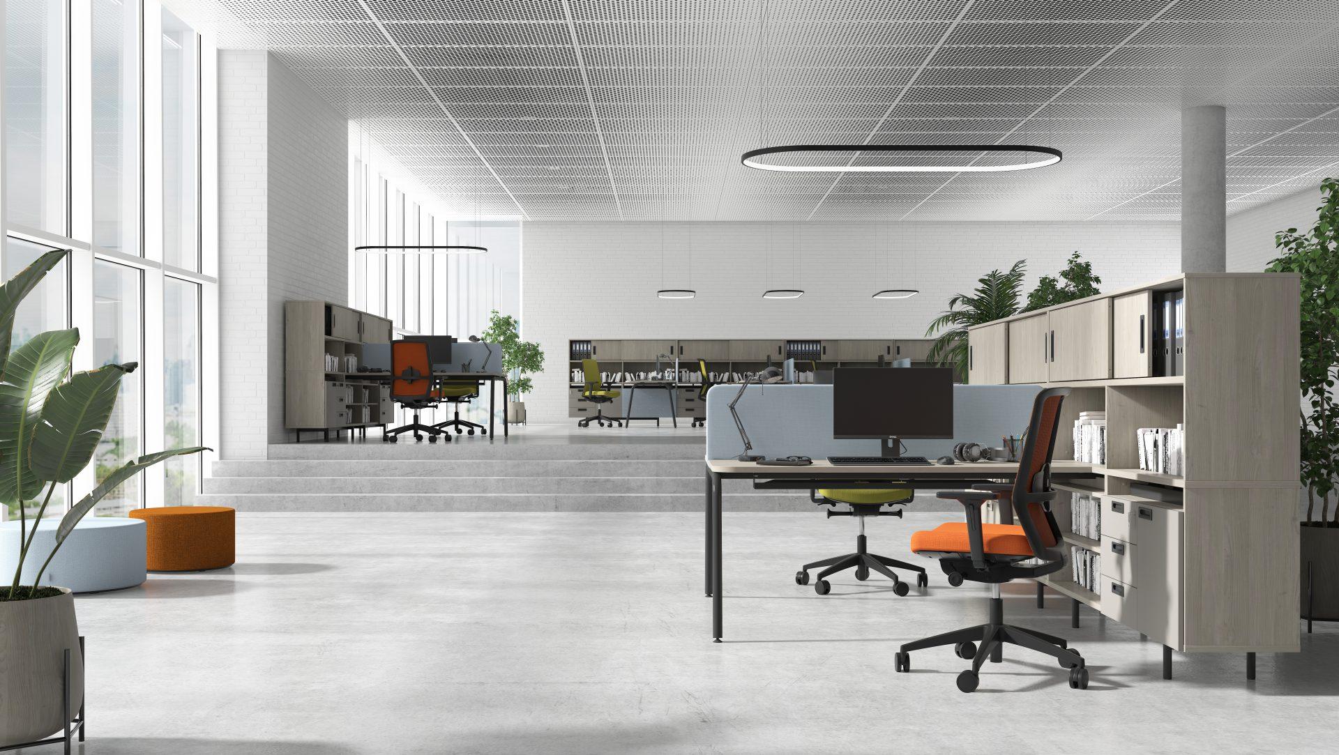 Round workstations help to partition open plan office layouts