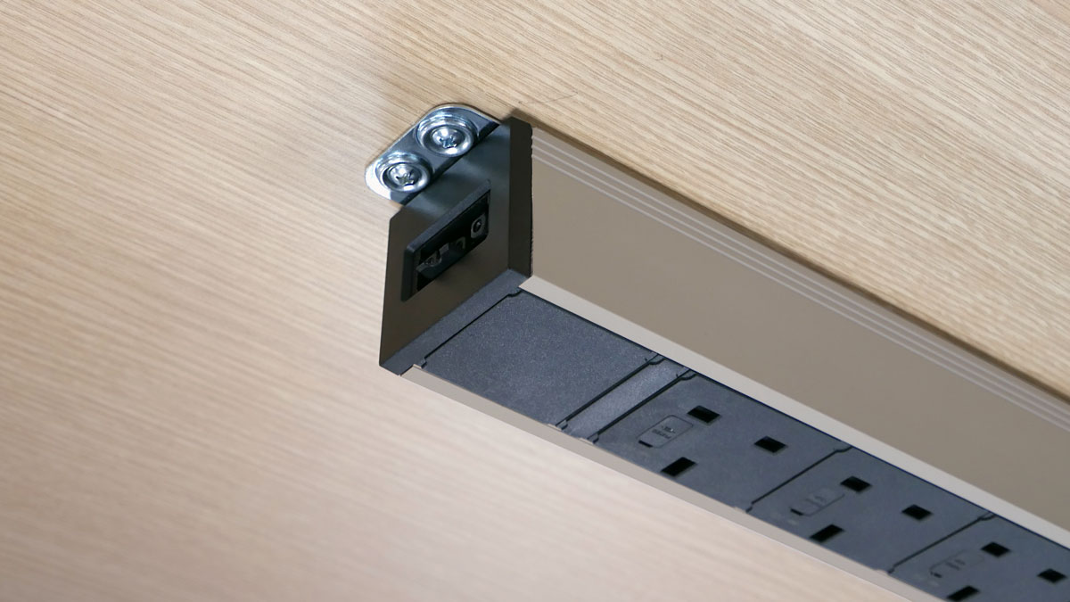 Powerlink can be fixed to underside of desktop or sit in a cable tray