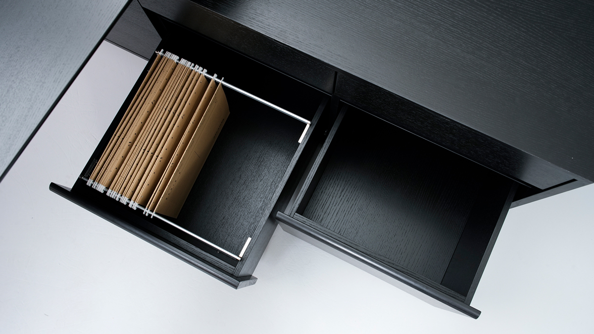 The optional storage pedestal offers 2 small drawers and 2 large drawers with file storage