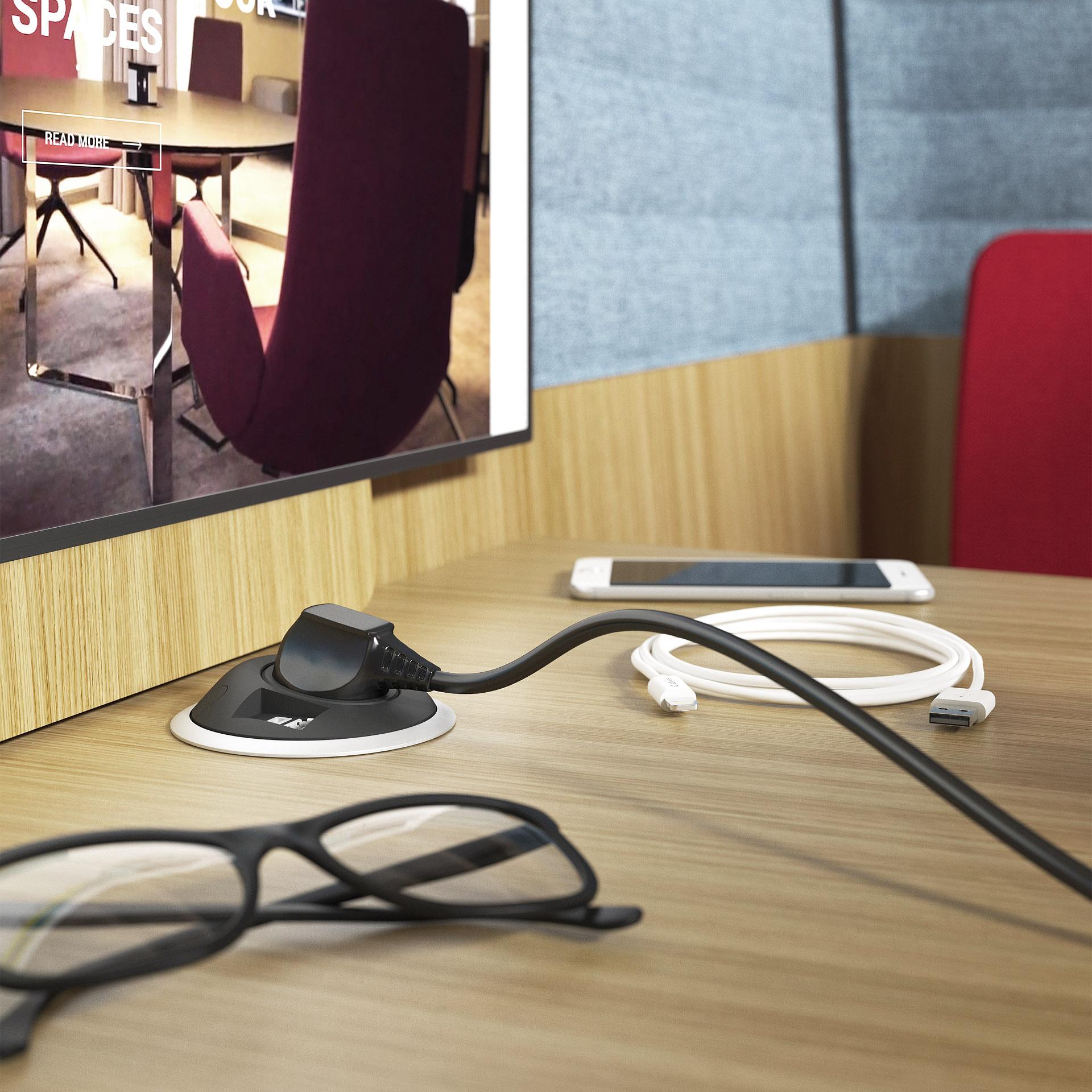 The meeting table option is equipped with a power and charge for any devices