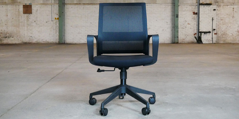 Available from stock with black mesh back and black fabric seat.