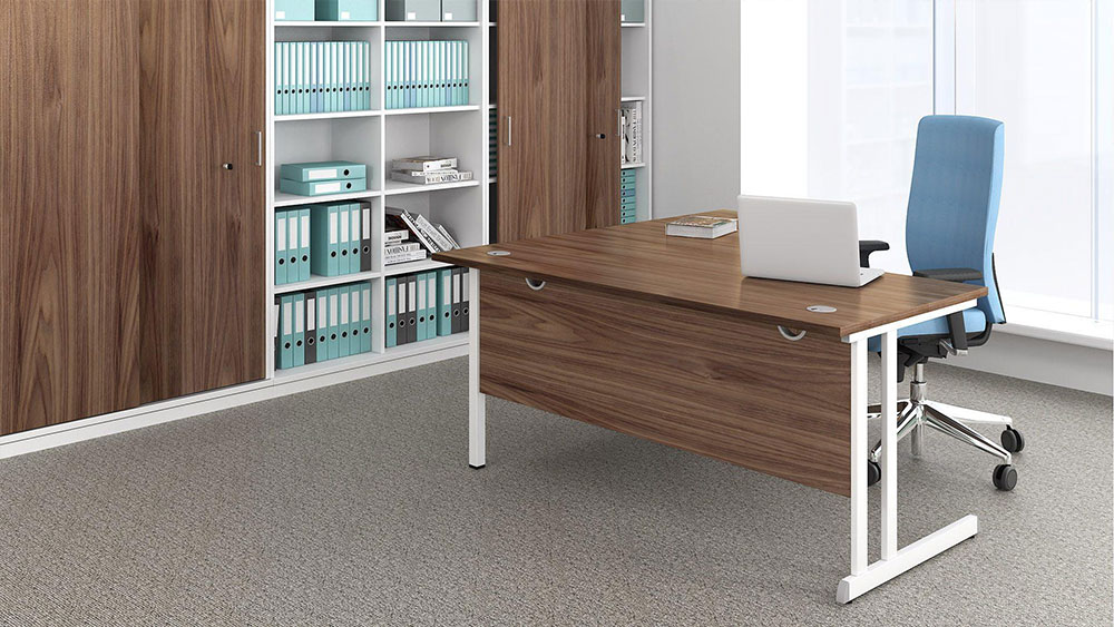 Optima C crescent desk in a striking combination of dark walnut top/modesty panel and white cantilever legs.