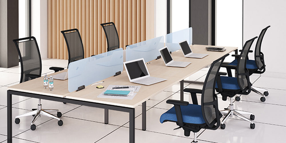 Nova Plexiglas acrylic desktop screens in ice blue with Nova U-leg bench desks