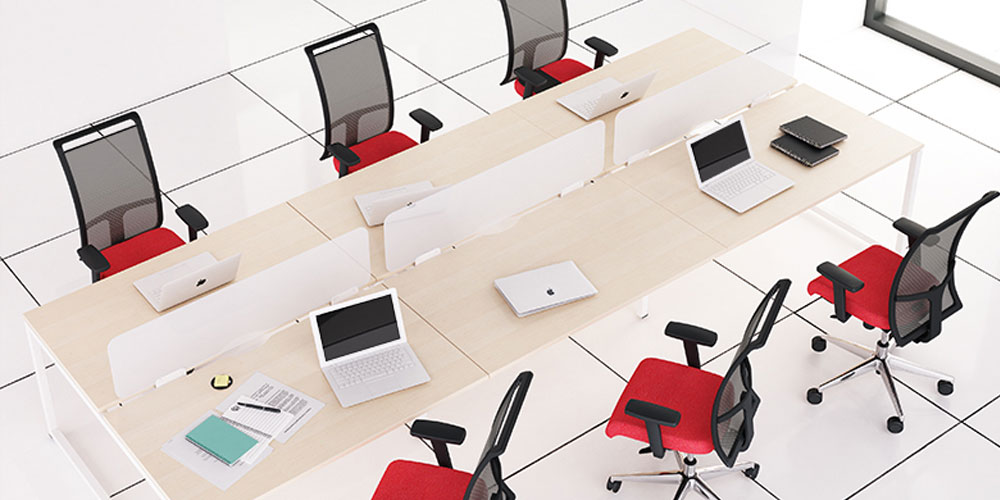 Nova Plexiglas acrylic desktop screens in white with Nova U-leg bench desks