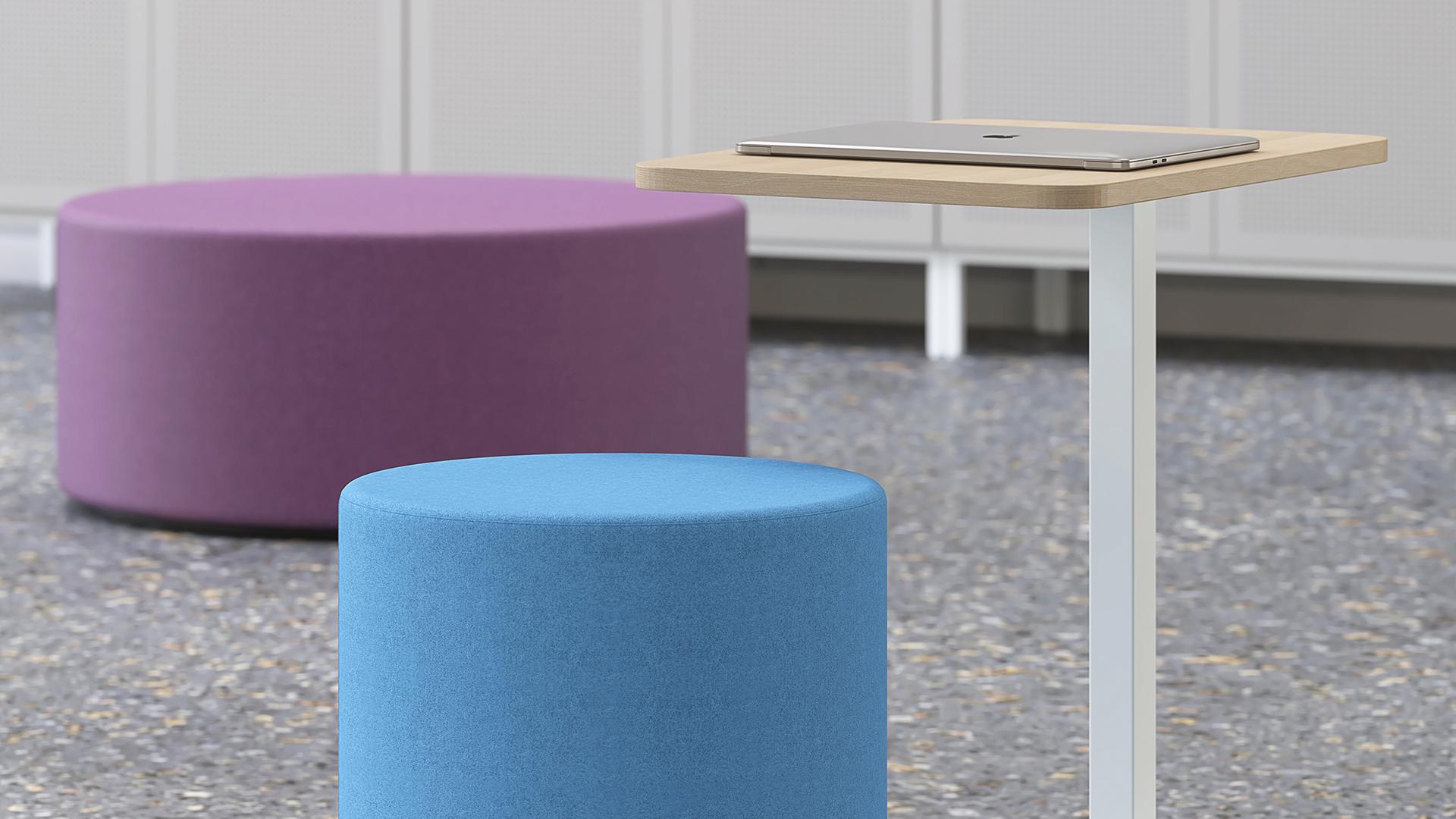 Giro fabric soft seating poufs with Mobi coffee table